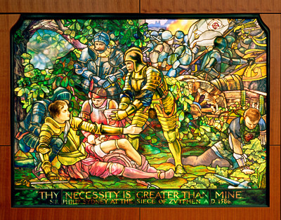 The Tiffany stained-glass window in the Rothkopf Reading room shows the Death of Sir Philip Sidney during the Battle of Zutphen.